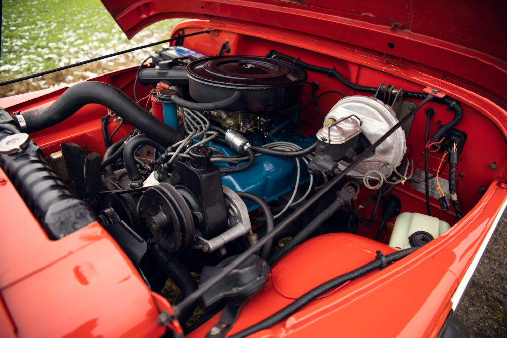 Red vintage car engine detailed view