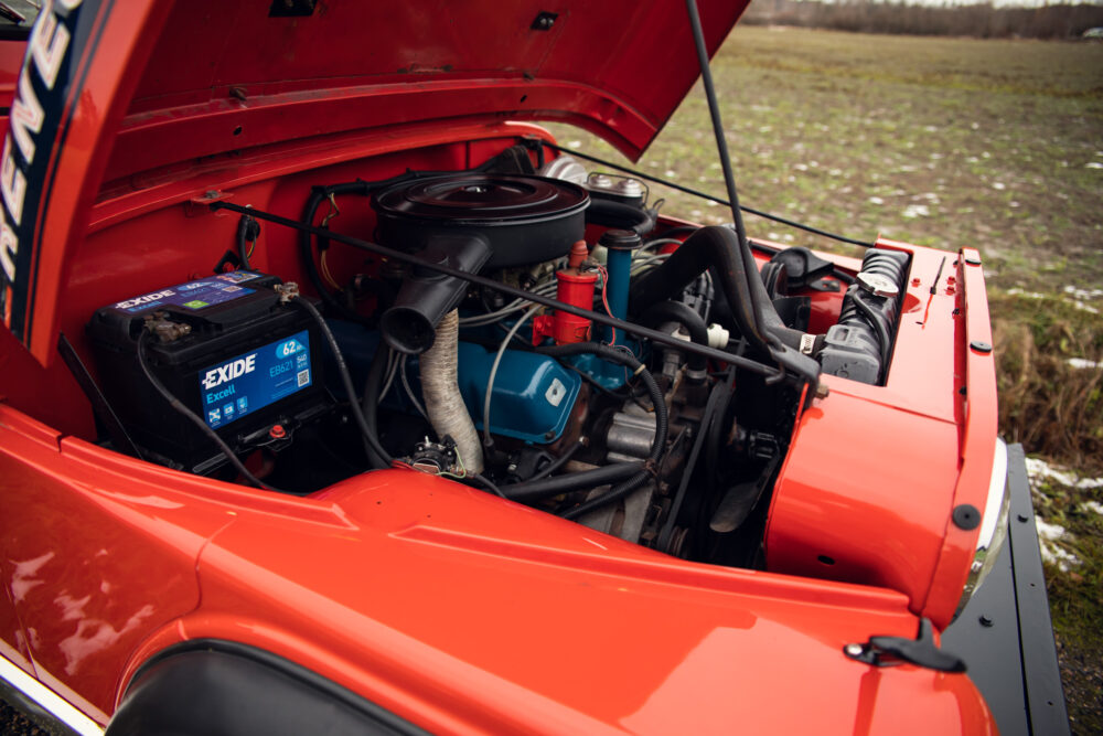 Red classic car engine detailed view