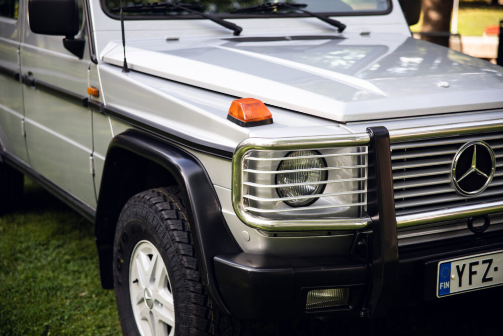 Silver Mercedes SUV parked outdoors