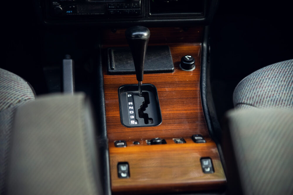 Vintage car's wooden gear shift panel