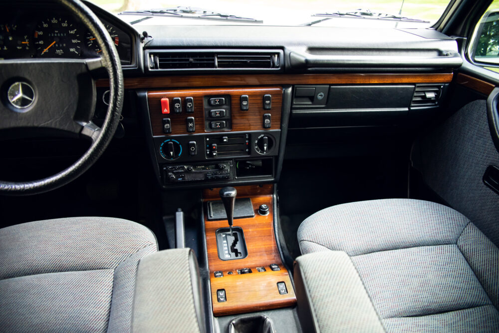 Vintage car interior with wooden panel dashboard