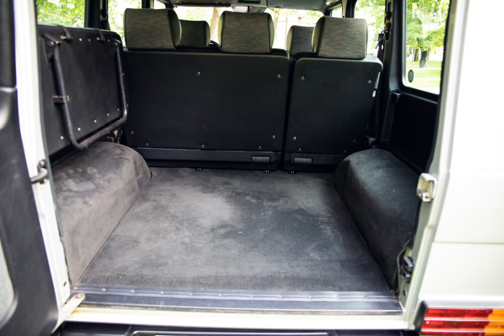 Interior view of empty vehicle trunk and rear seats