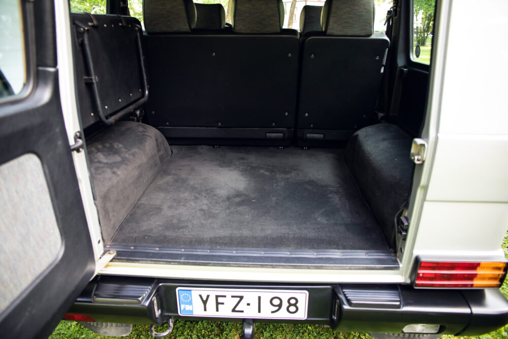 Open rear compartment of a van showing empty space