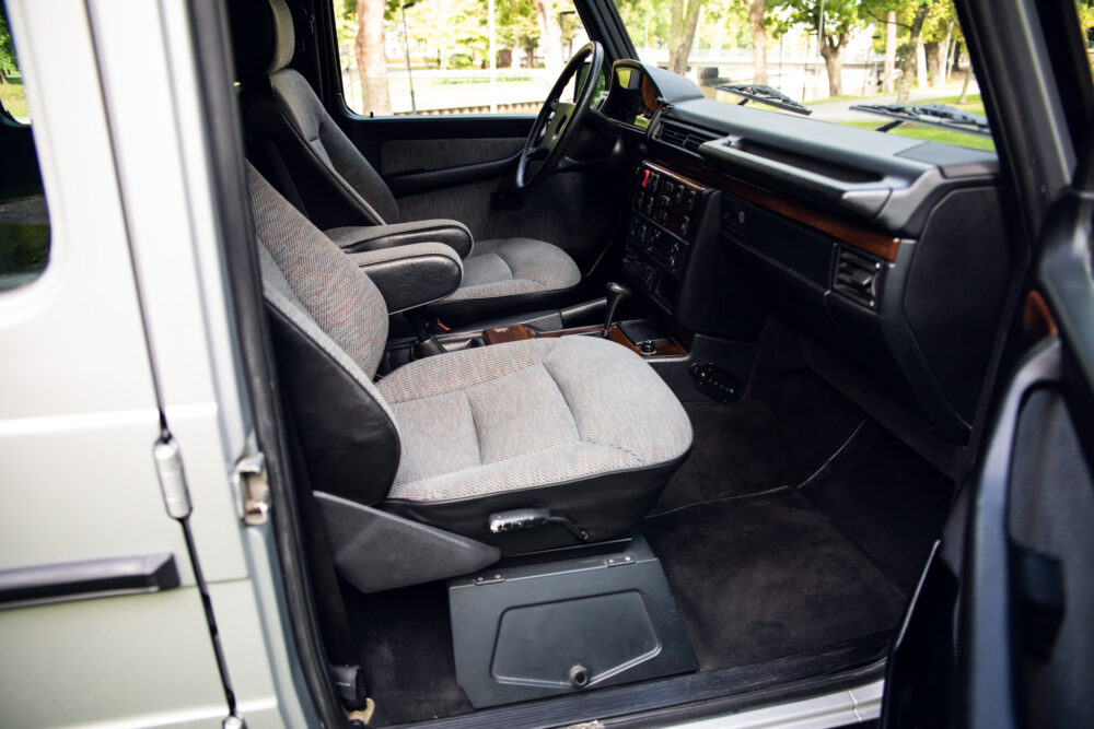 Classic car interior with fabric seats and dashboard