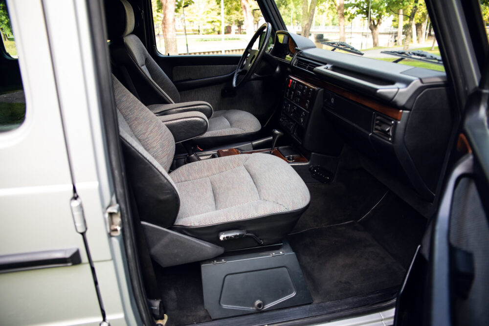 Vintage car interior with fabric seats and dashboard