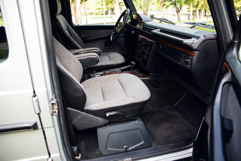 Vintage car interior with fabric seats and dashboard