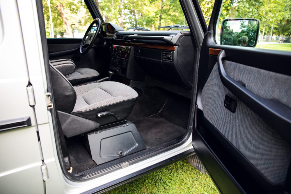 Open car door showing vintage vehicle interior design