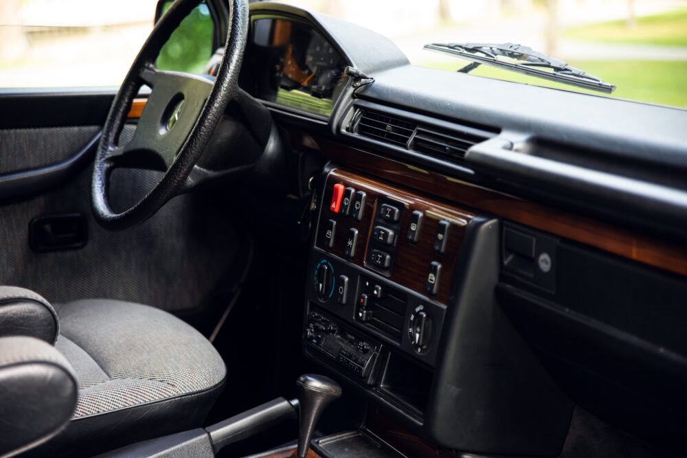 Vintage car interior, steering wheel and dashboard