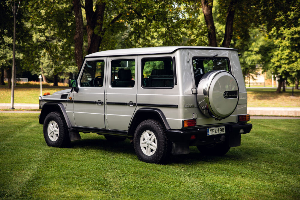 Silver Mercedes-Benz G-Class SUV in park