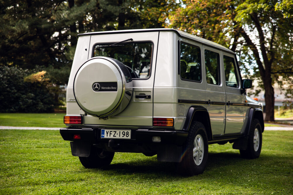 Mercedes-Benz G-Class SUV parked in lush green park