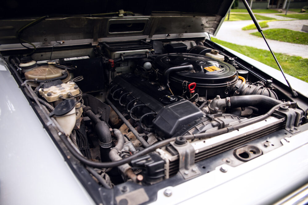 Detailed view of an open classic car engine compartment