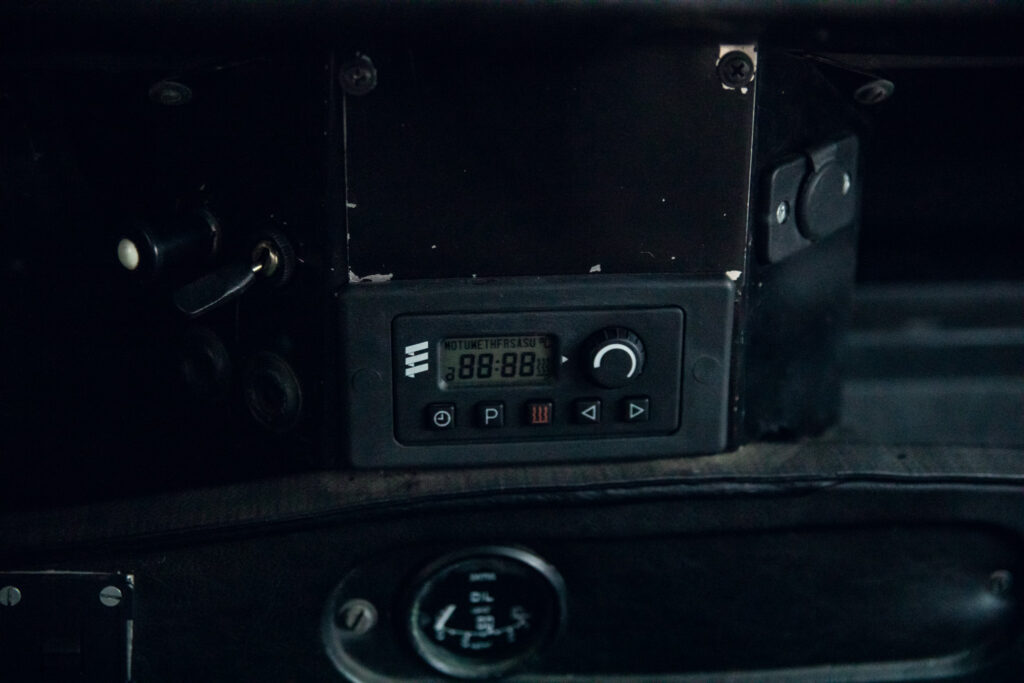 Close-up view of a dark digital car radio display