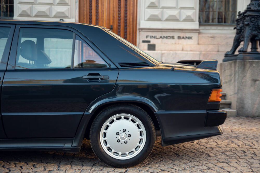 Vintage black car parked near Finlands Bank building