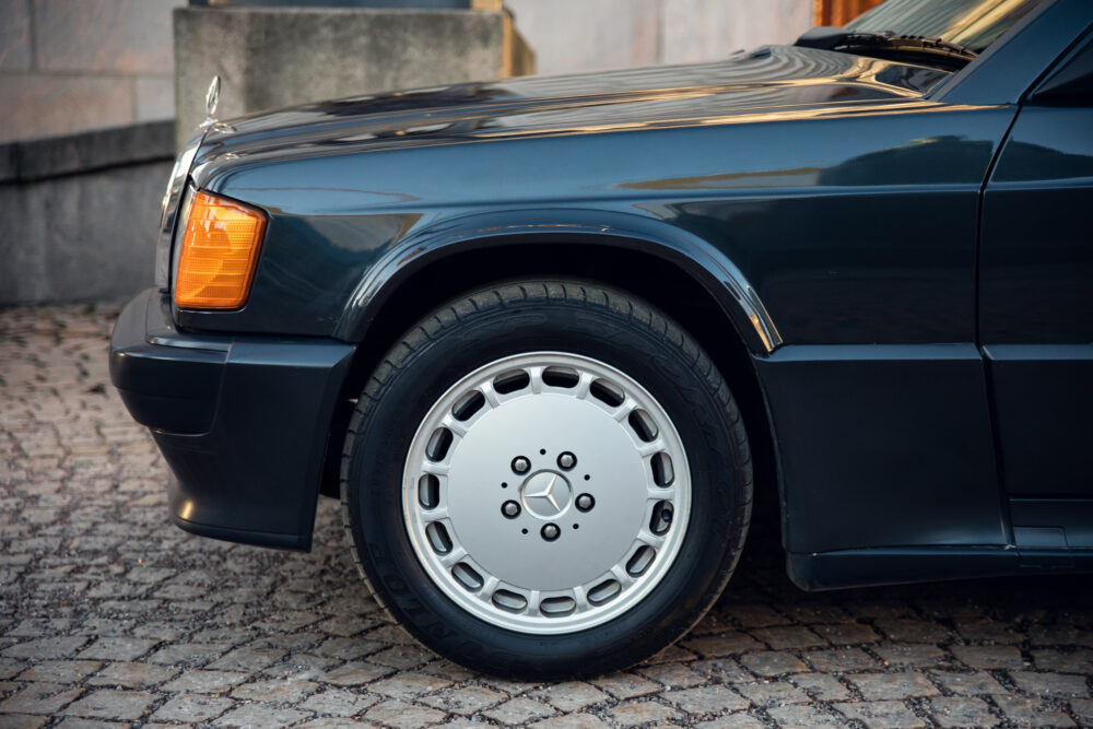 Black Mercedes car front wheel and headlight