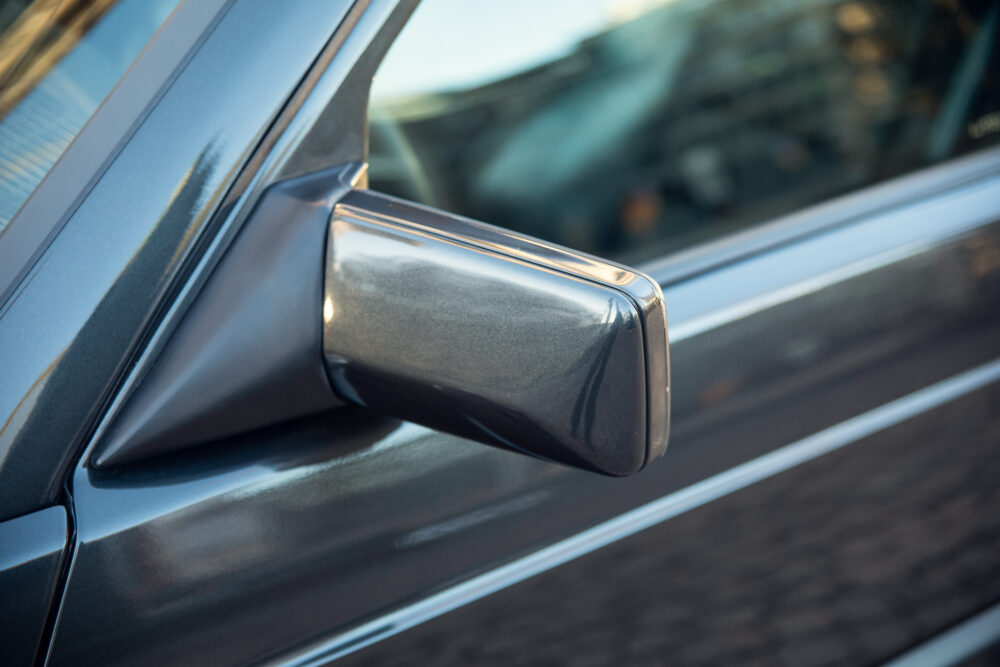 Close-up of car side mirror