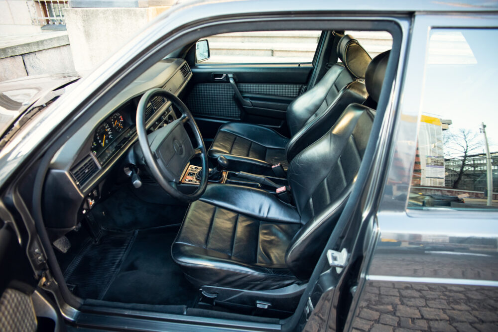 Classic car interior with leather seats and dashboard