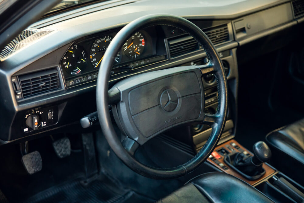 Vintage Mercedes-Benz interior with dashboard and steering wheel