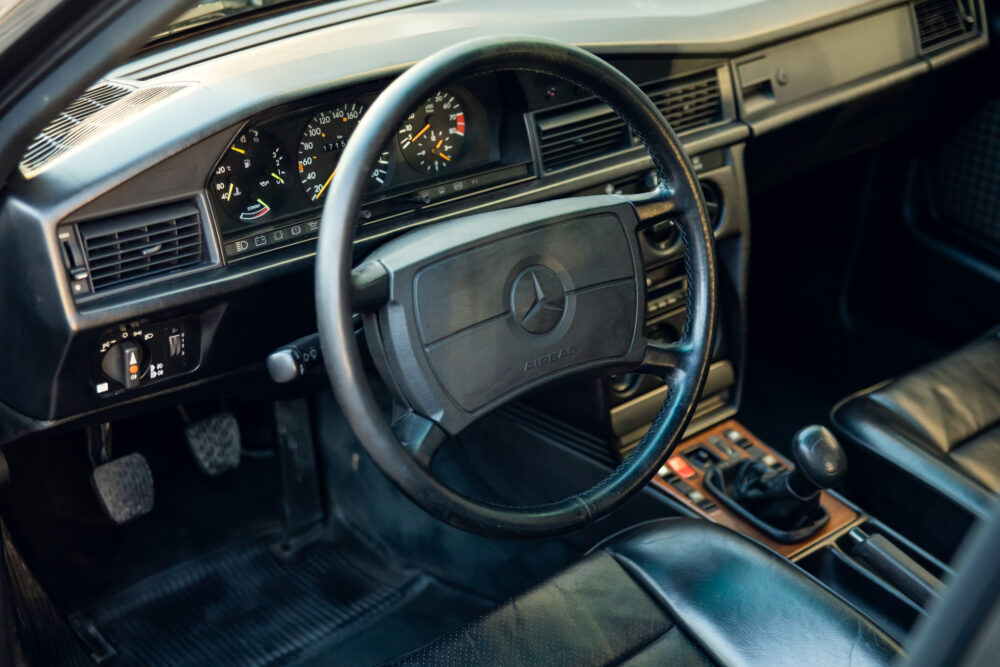 Vintage Mercedes dashboard and steering wheel interior view