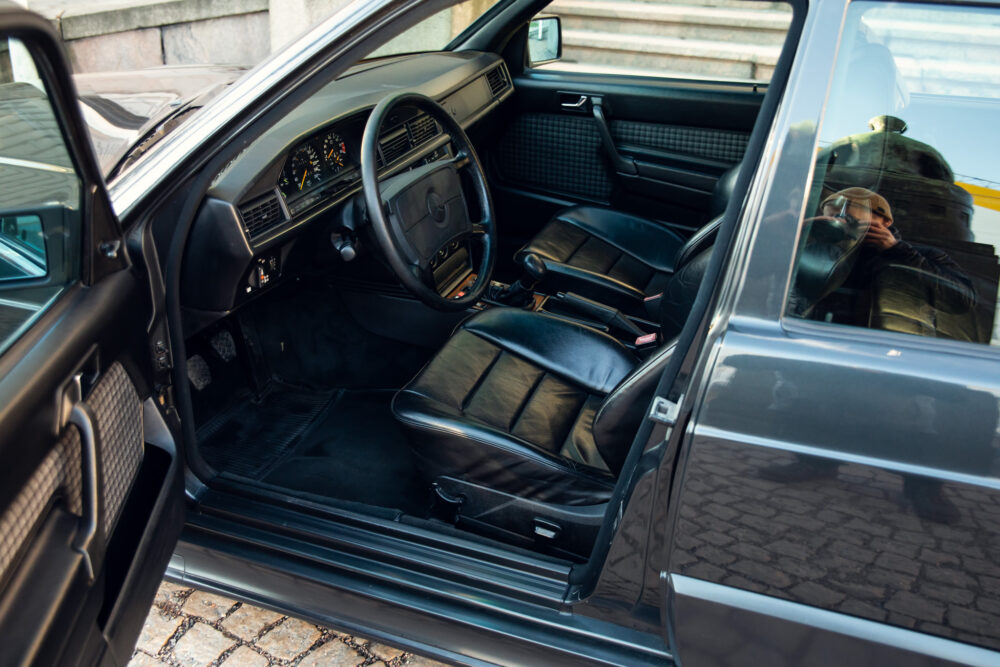 Vintage car interior with open door