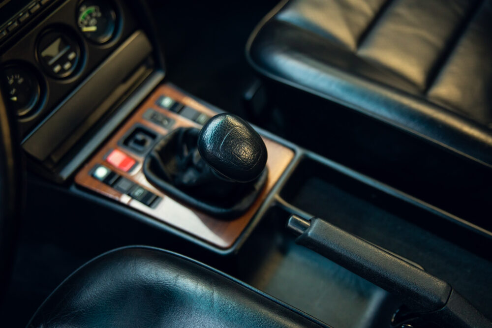 Vintage car's gear shift and dashboard close-up