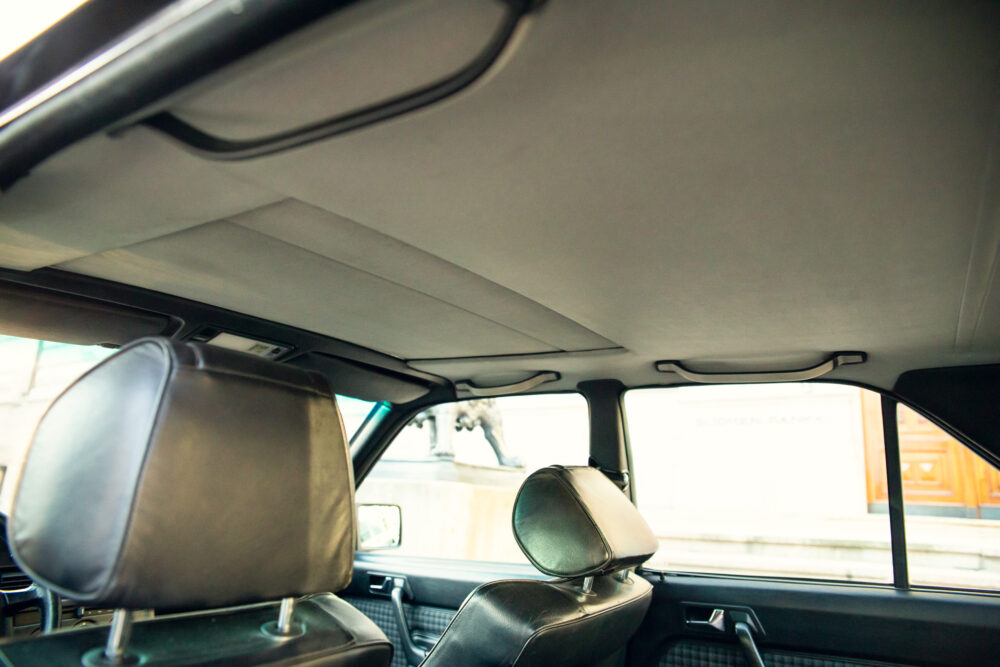 Interior view of a vintage car with leather seats