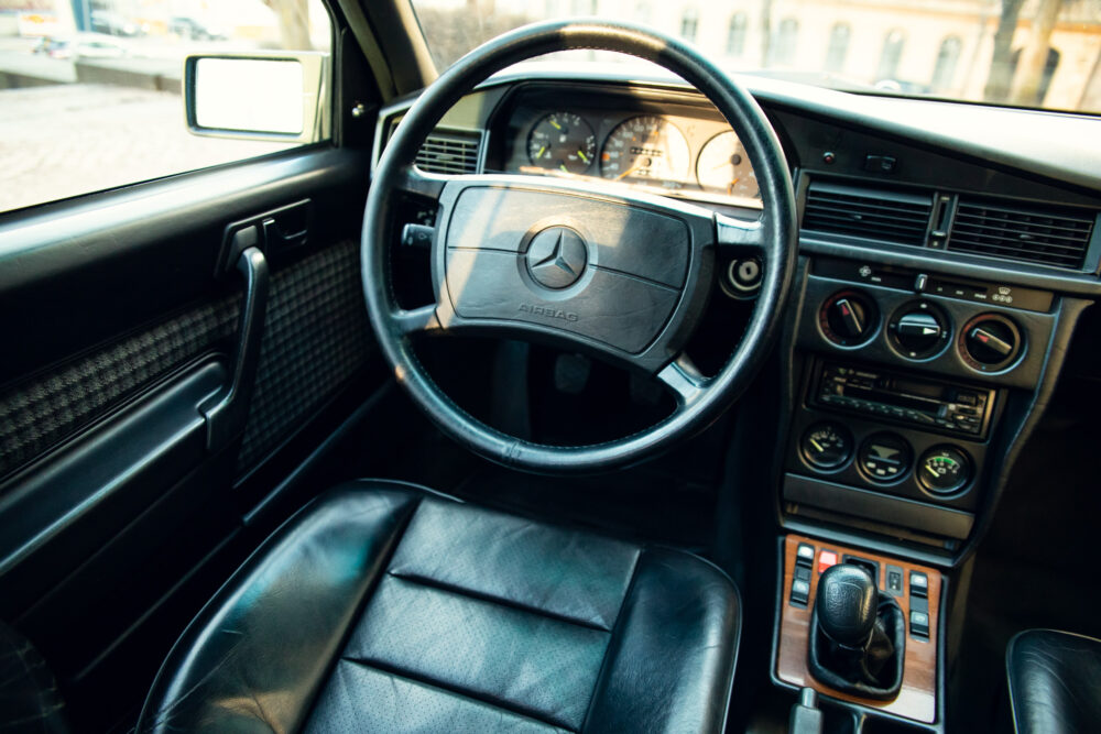 Vintage Mercedes-Benz interior, leather seats, classic dashboard