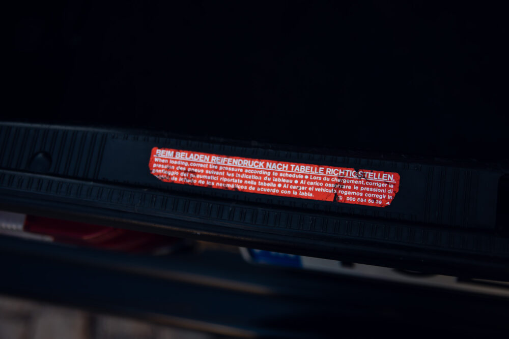 Vehicle loading instructions sticker on tailgate