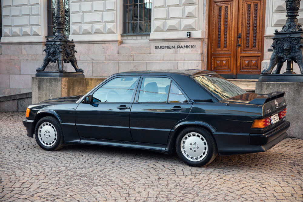 Black vintage sedan outside Suomen Pankki building