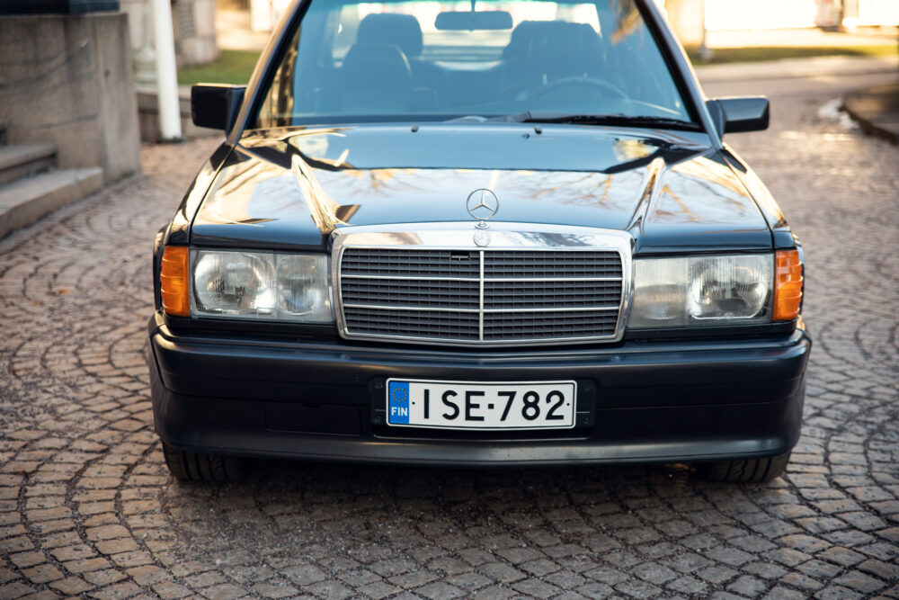 Vintage Mercedes-Benz car parked on cobblestone street