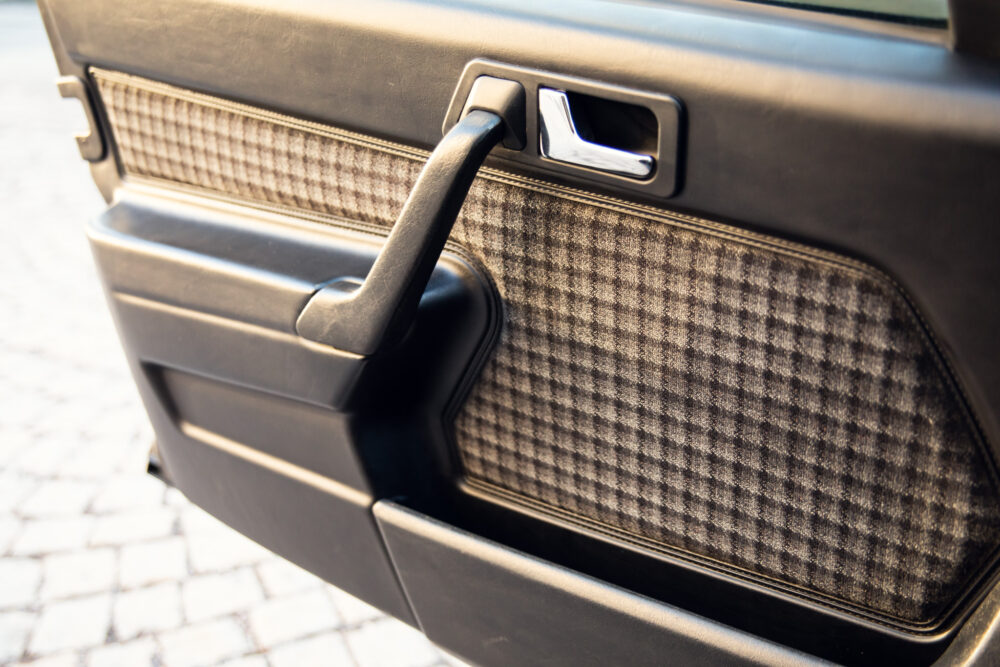 Close-up of vintage car door interior details