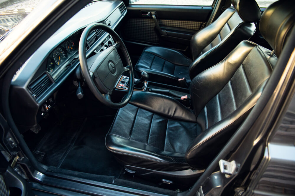 Vintage car's stylish interior with leather seats and dashboard