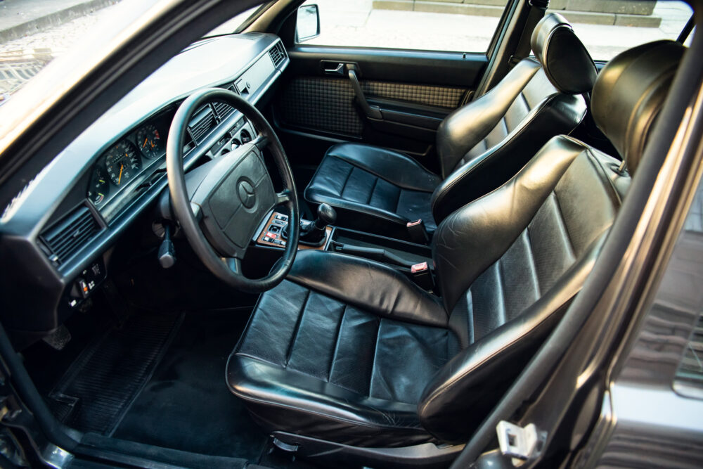 Vintage car interior with leather seats and dashboard