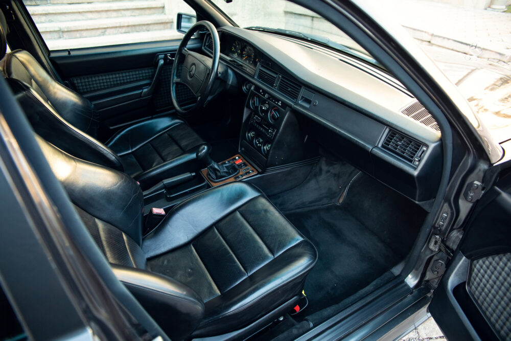 Vintage car interior with black leather seats