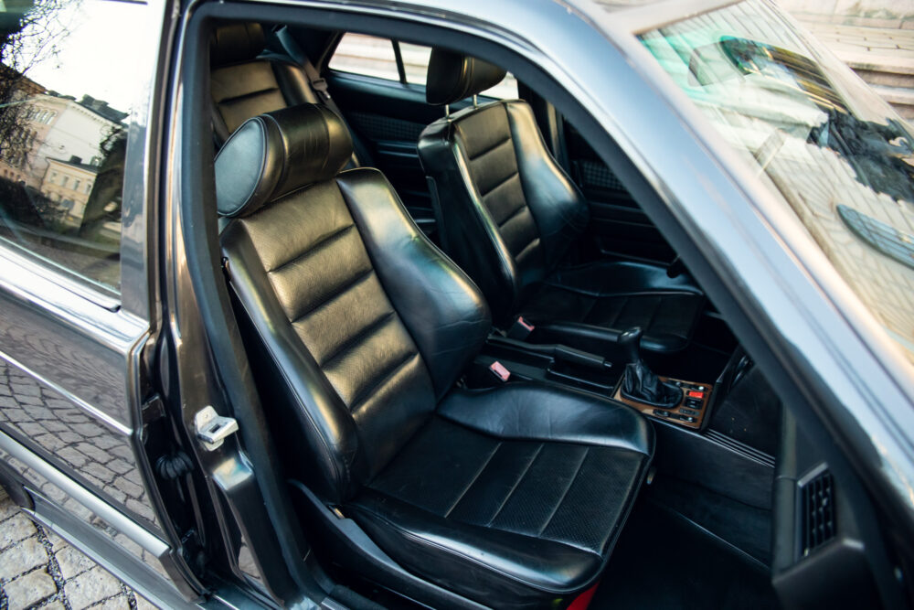 Open door view of vintage car's leather interior