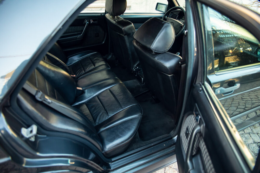 Vintage black car interior with leather seats