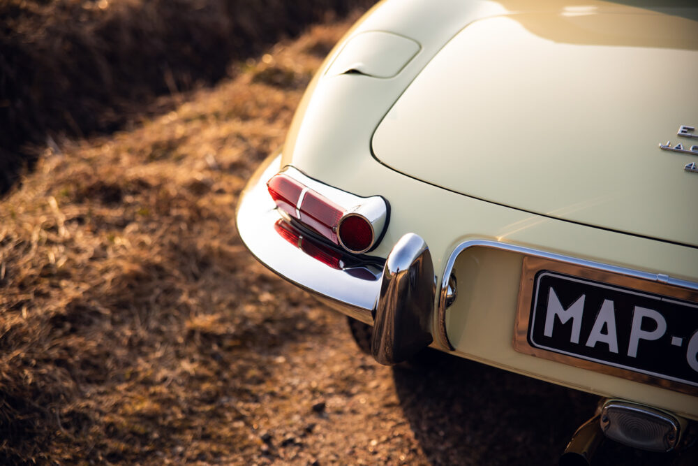 Vintage car rear view at sunset