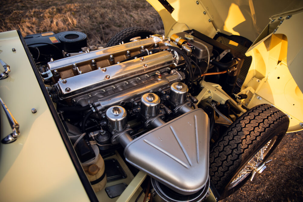 Vintage car engine with chrome details and open hood