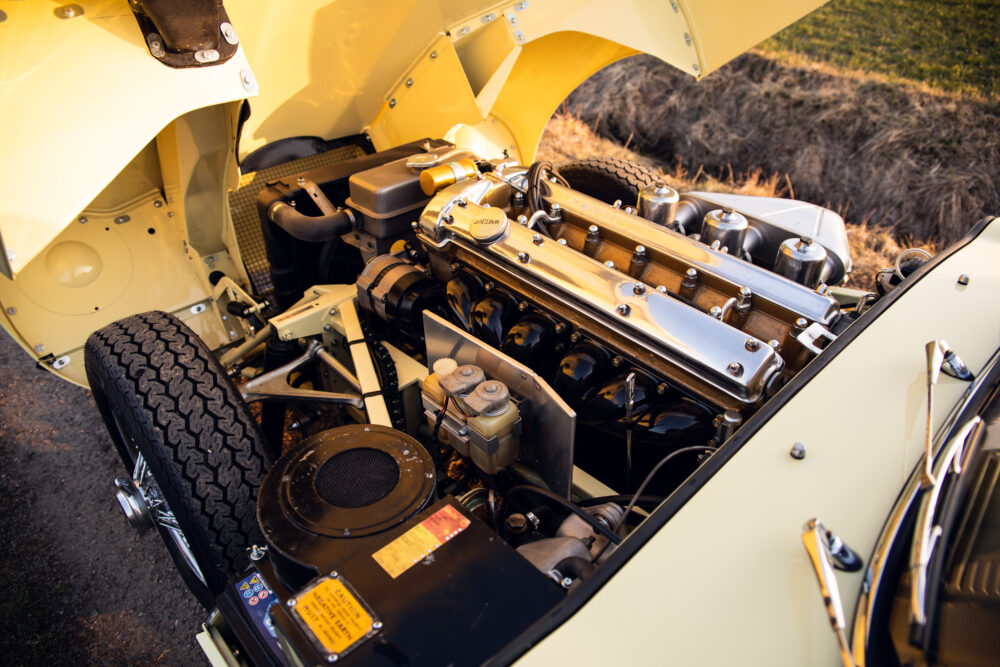 Vintage car engine detailed view at sunset