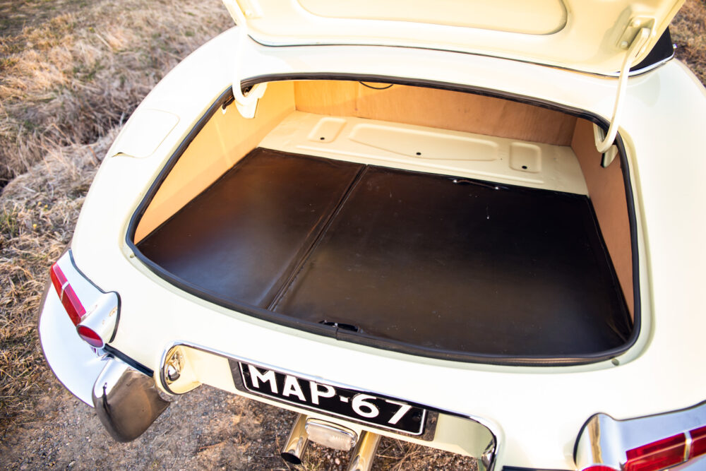 Vintage car with open trunk showing empty space