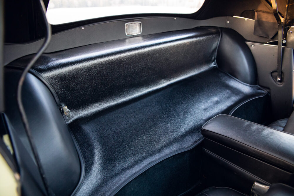 Vintage car black leather backseat interior