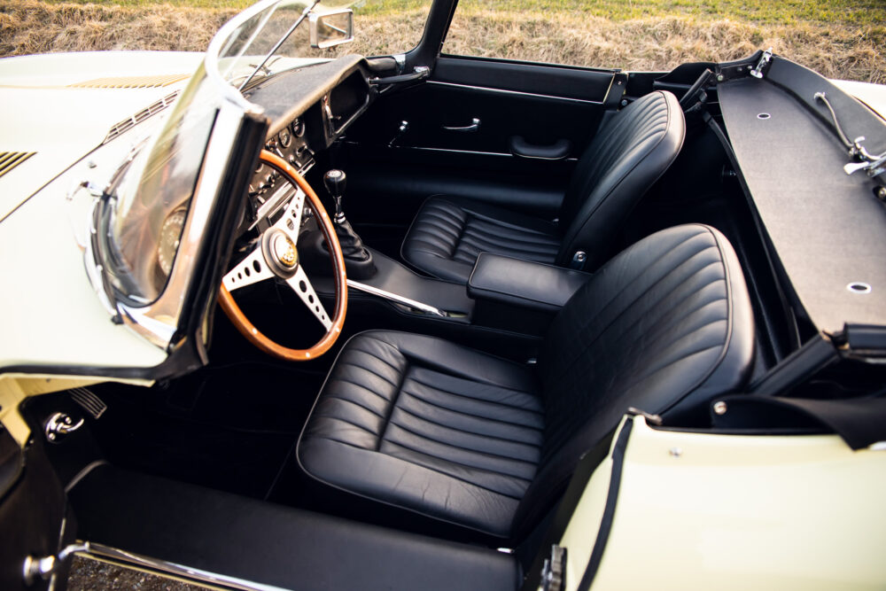 Vintage cream convertible car interior with leather seats