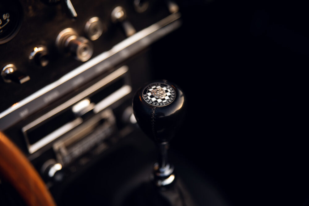 Vintage car's gear shift and dashboard close-up