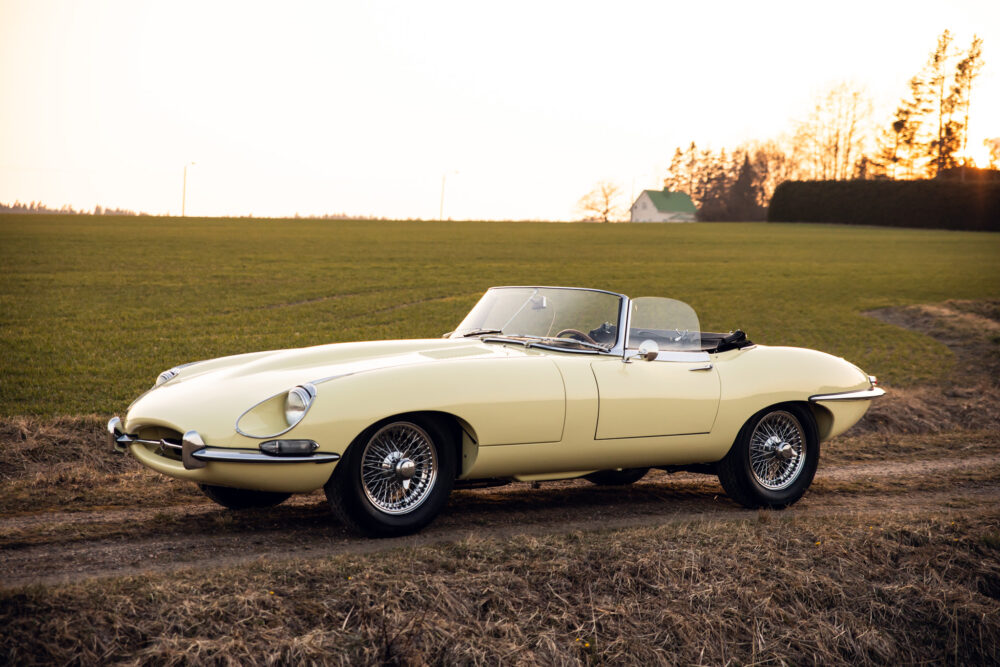 Vintage yellow convertible car in rural setting