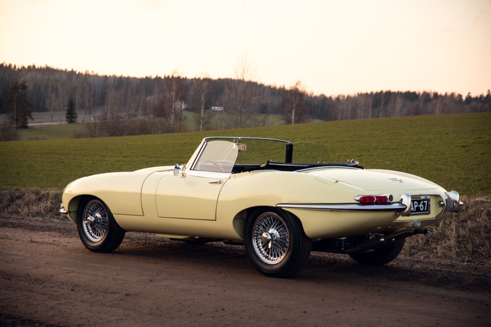 Vintage yellow convertible car in countryside sunset