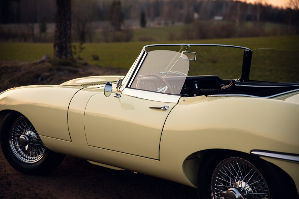 Vintage yellow convertible car parked outdoors