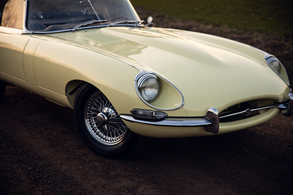Vintage yellow sports car with chrome details
