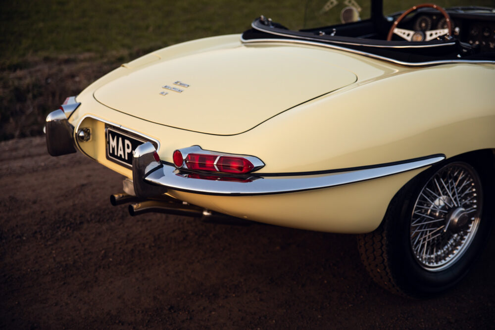 Vintage yellow convertible car with detailed rear view