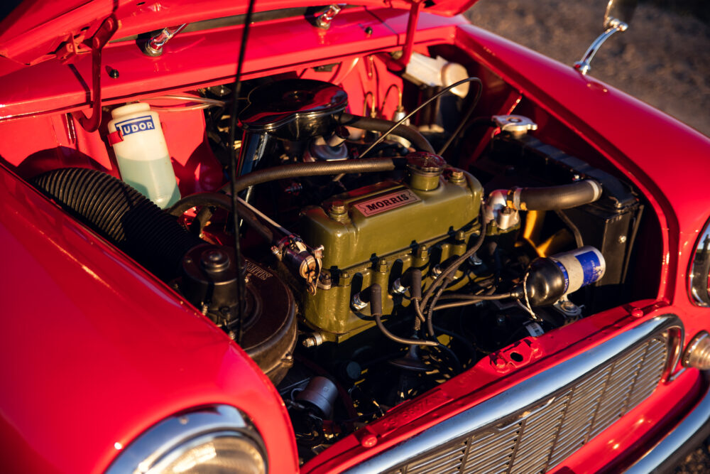 Detailed view of classic car's red engine bay