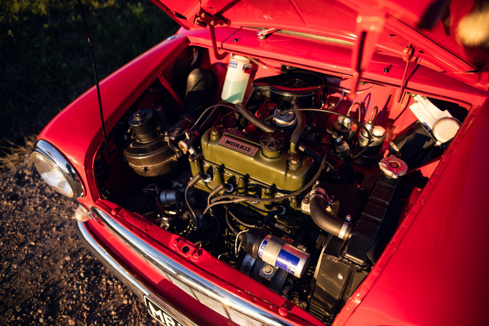 Vintage Morris car engine in red vehicle