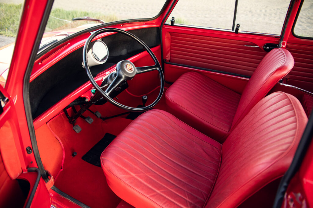 Vintage red car interior with leather seats